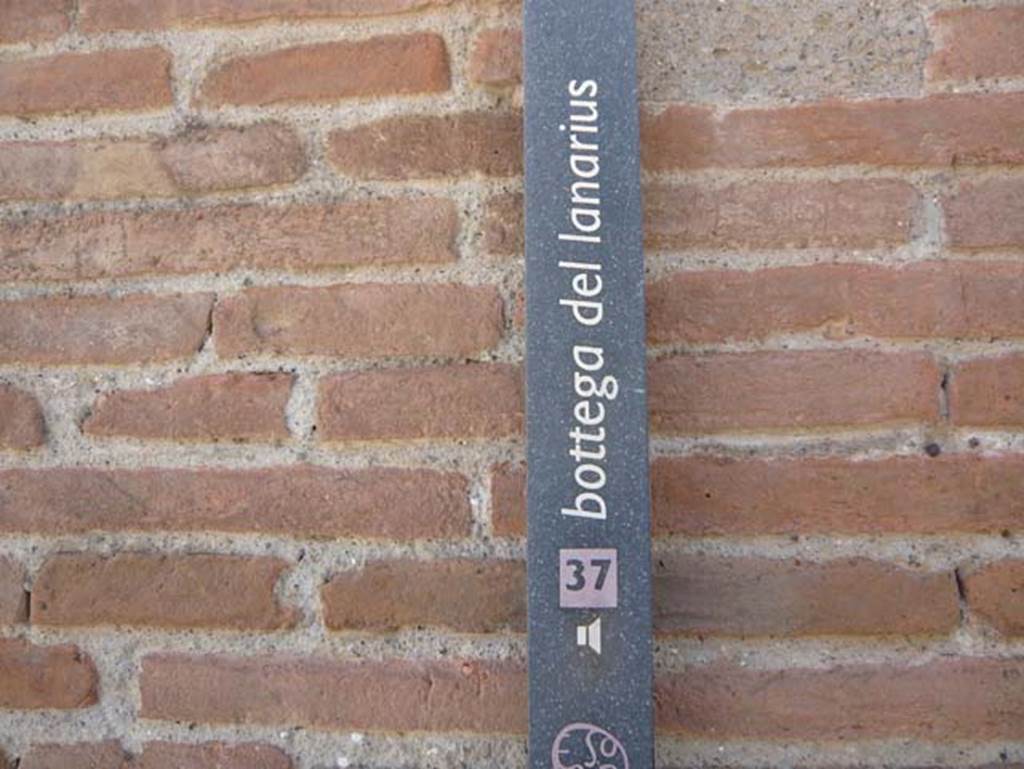 III.10 Herculaneum, August 2013. Identification name-plate. Photo courtesy of Buzz Ferebee.